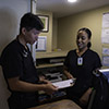 San Francisco - staff members examine paperwork